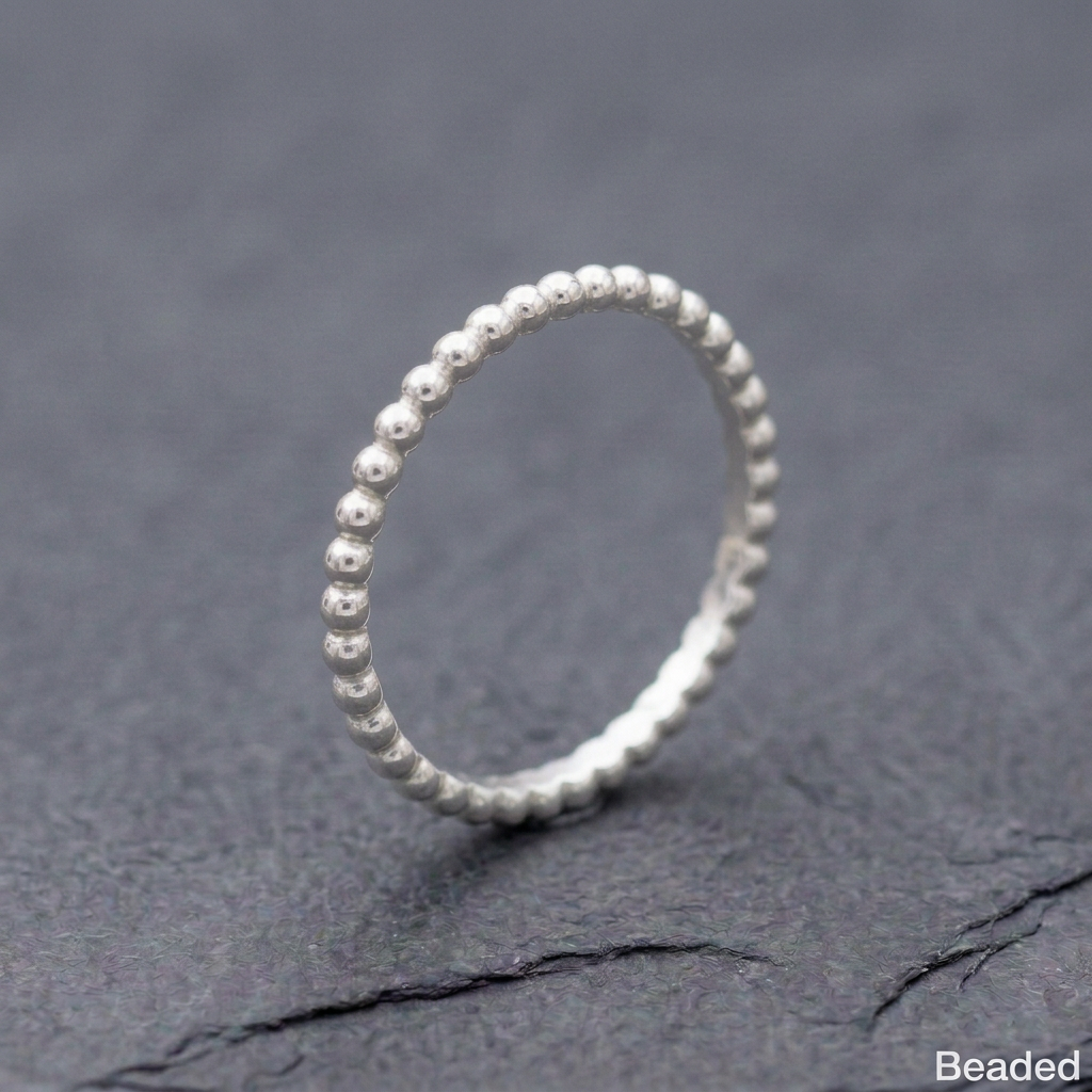 Beaded ring with beads continuing all the way around and no flat section