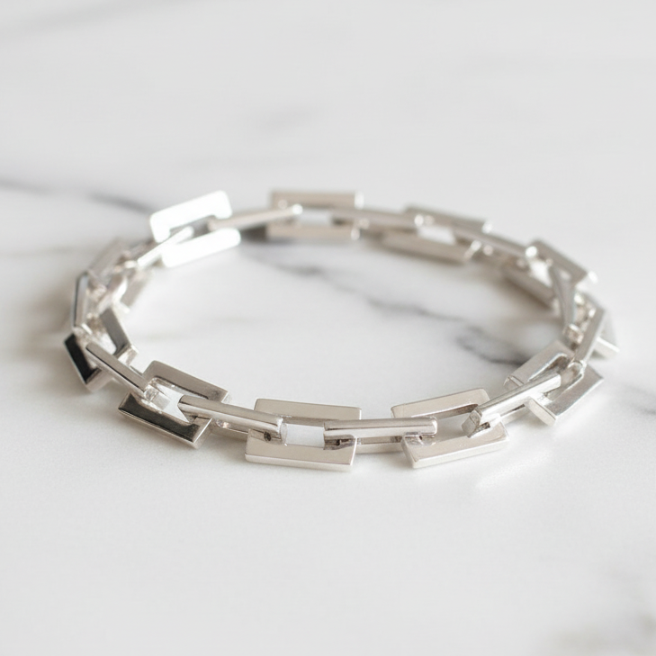 Chunky Rectangular Link Chain Sterling Silver Bracelet on indoor surface - square