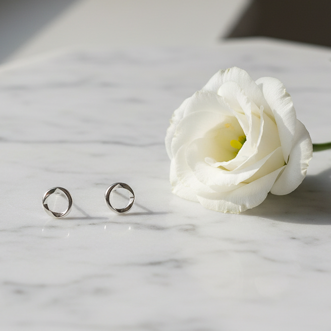 Cornered Ring Stud Earrings Flat-lay with Flower