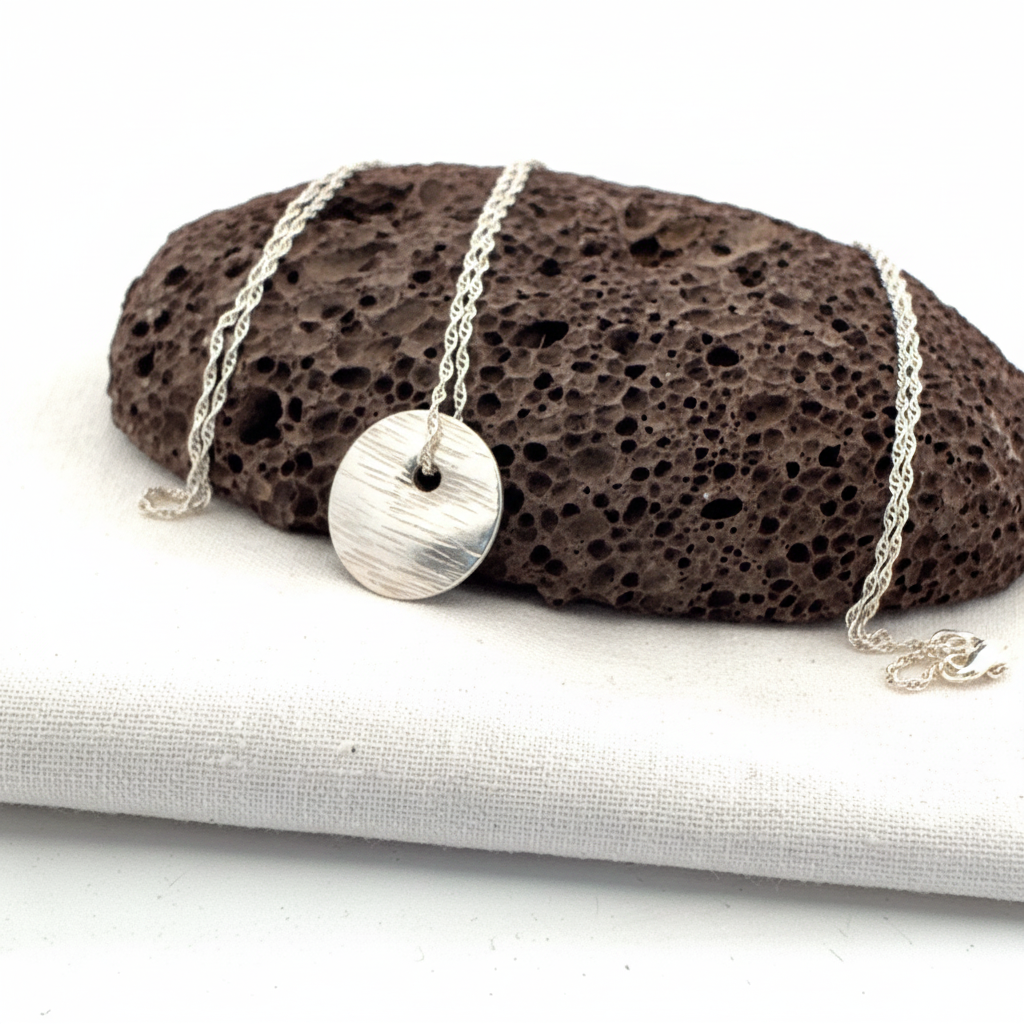 Disc pendant - product on rock