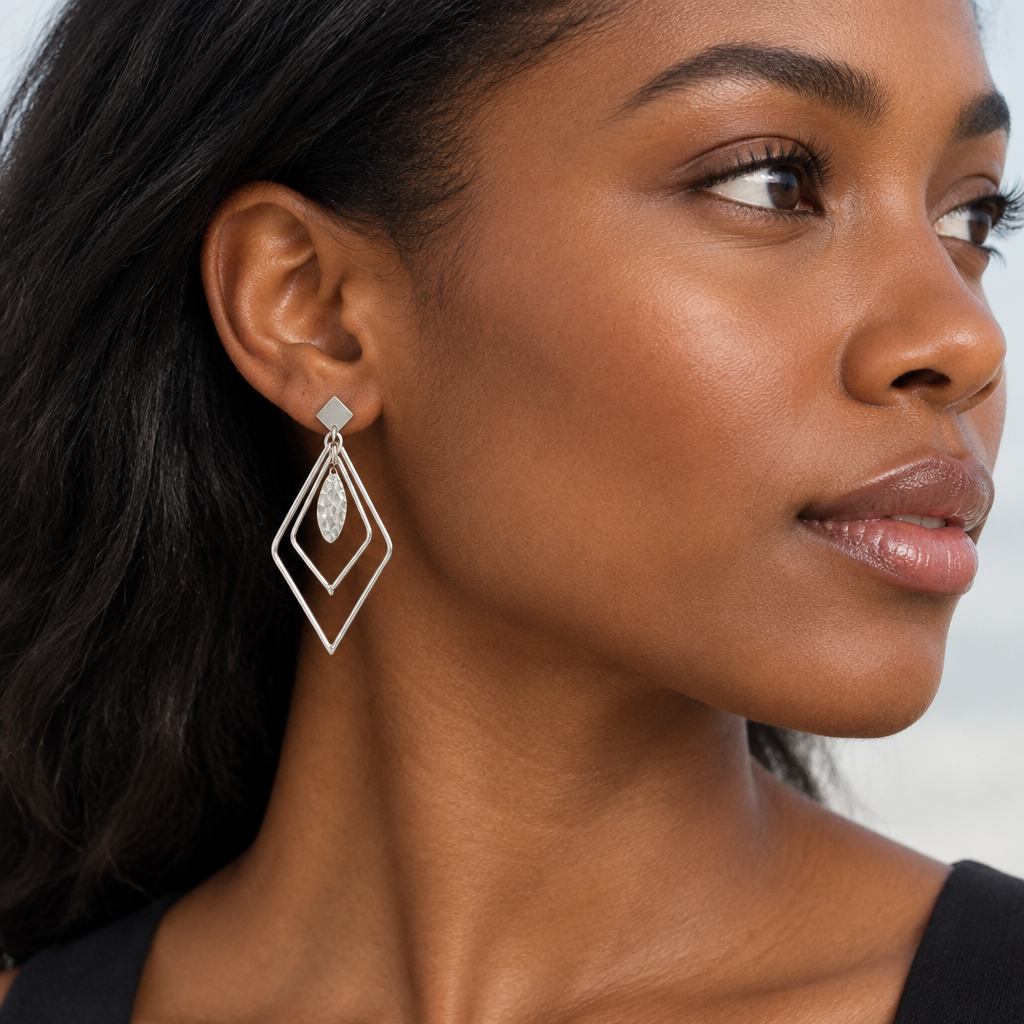 Model wearing Prism sterling silver drop earrings