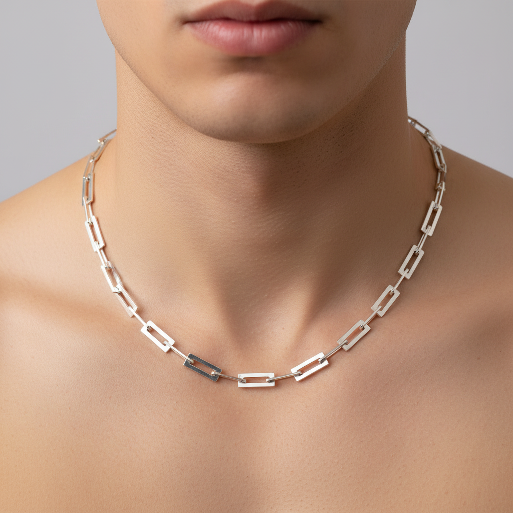 Male model wearing smooth rectangular link silver necklace