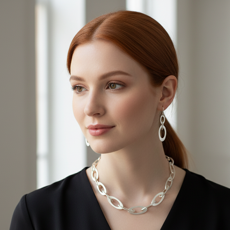 Red-haired woman wearing Oval Chain Earrings on ear hooks with Necklace