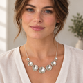 Revised square image of a young adult model wearing the silver necklace