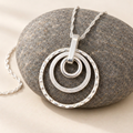 Ripples pendant with narrower bail and fine twisted chain on pebble