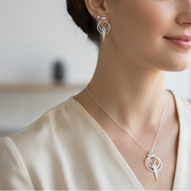 Woman wearing Avalon Earrings and Pendant set