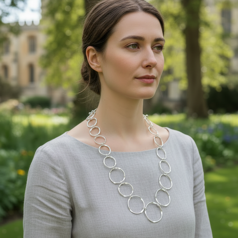 Woman wearing circle link necklace at medium length