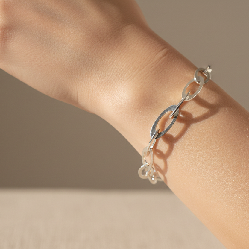 Woman wearing Oval Link Chain Sterling Silver Bracelet